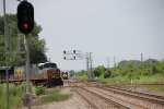 CSX 5491 leads M326 across the diamond as NS 6703 waits